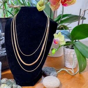 Motf  gold three strand necklace